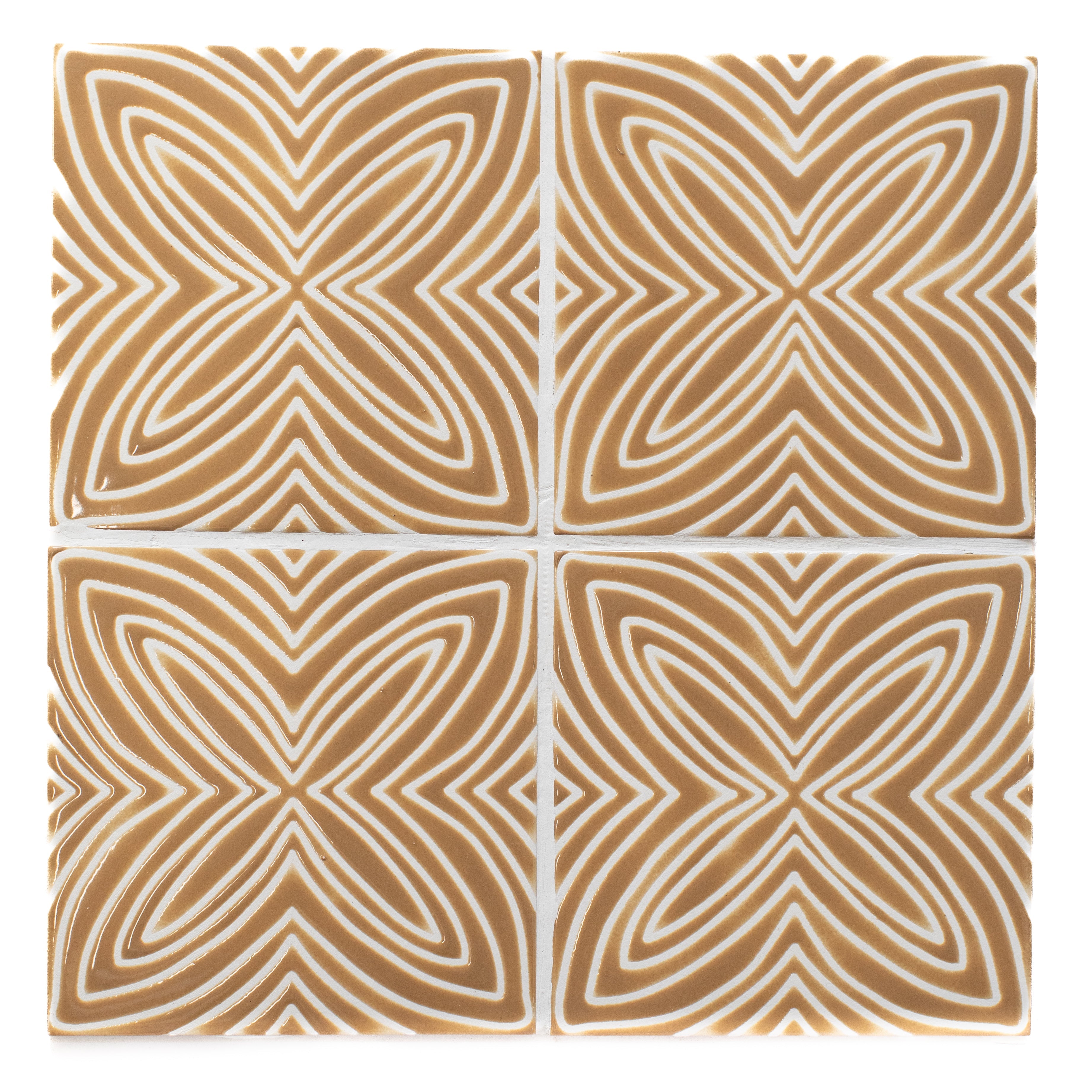 Four square tiles with a geometric pattern on a white background